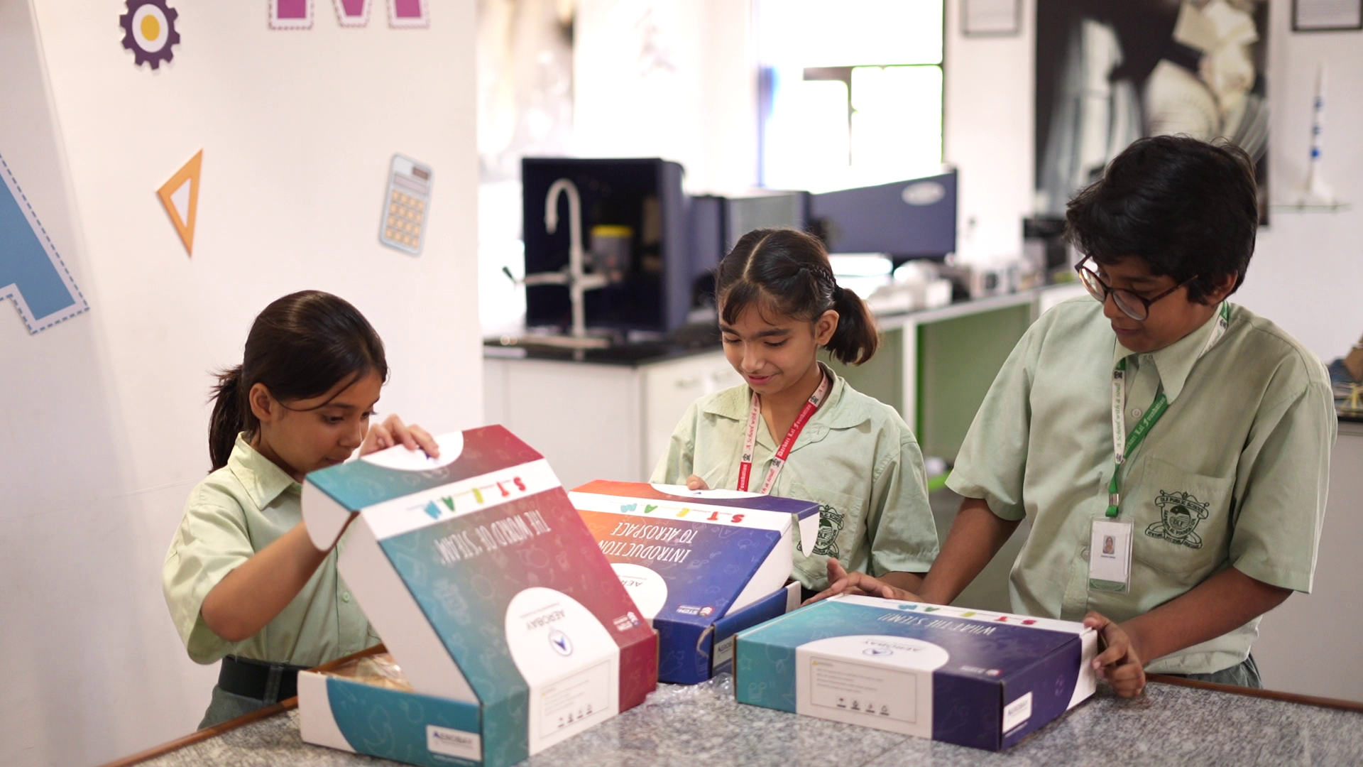 Students exploring an AeroBay learning kit